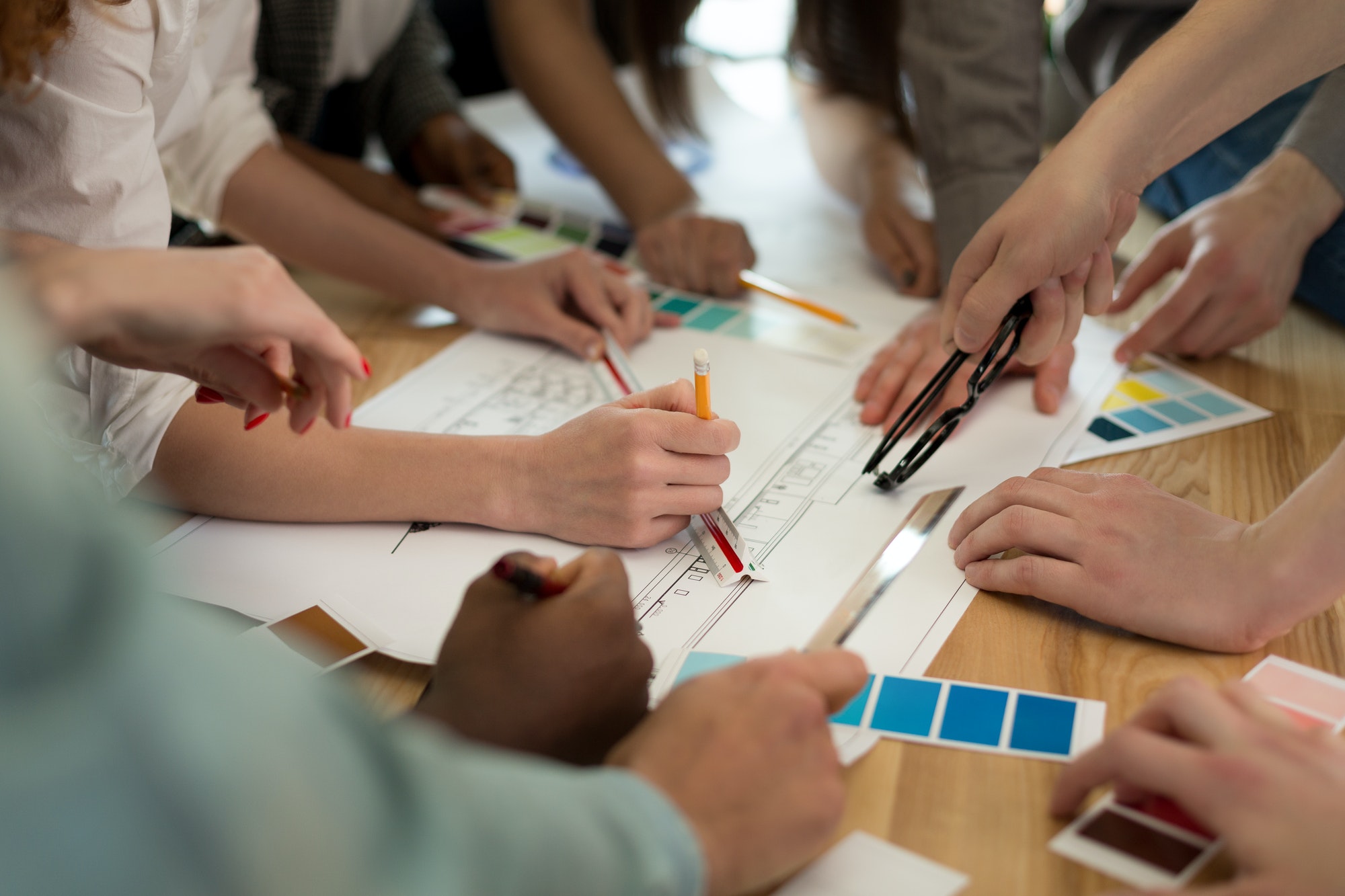Team of architects working on construction plans