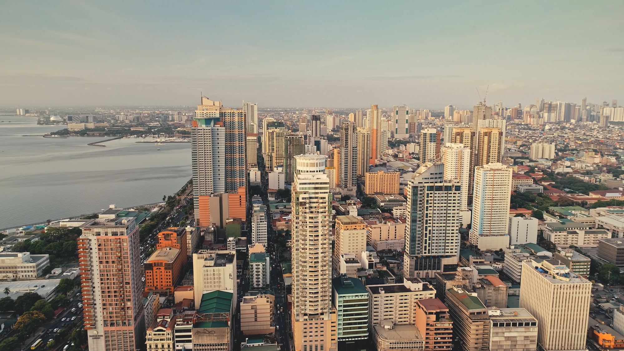 Tropic city cityscape with modern buildings and skyscrapers aerial. Philippines metropolis town