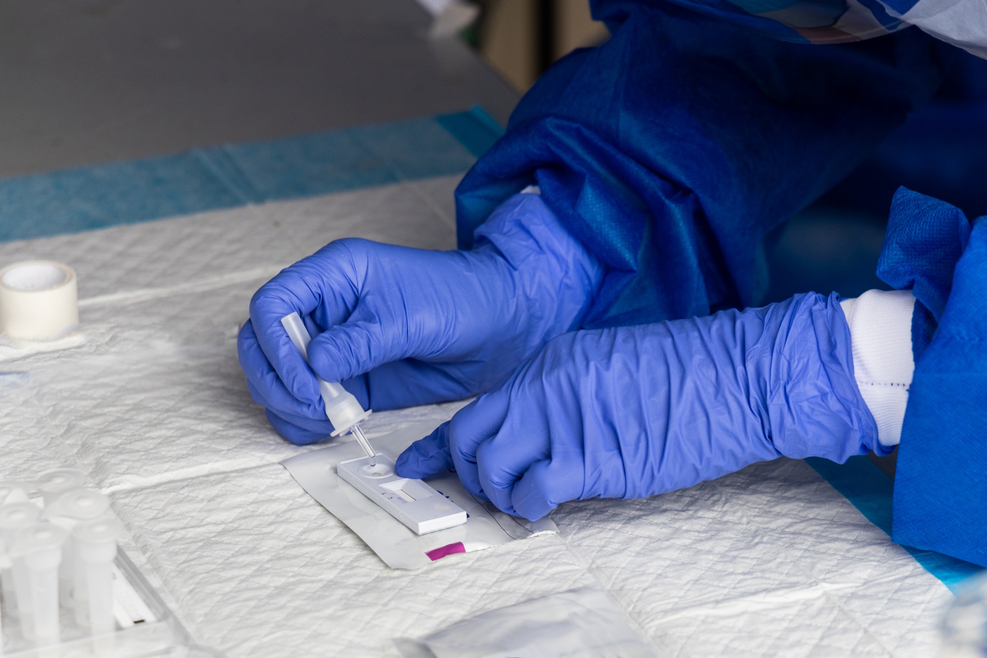 Series of healthcare worker preparing to test covid-19 swab culture on rapid test kit