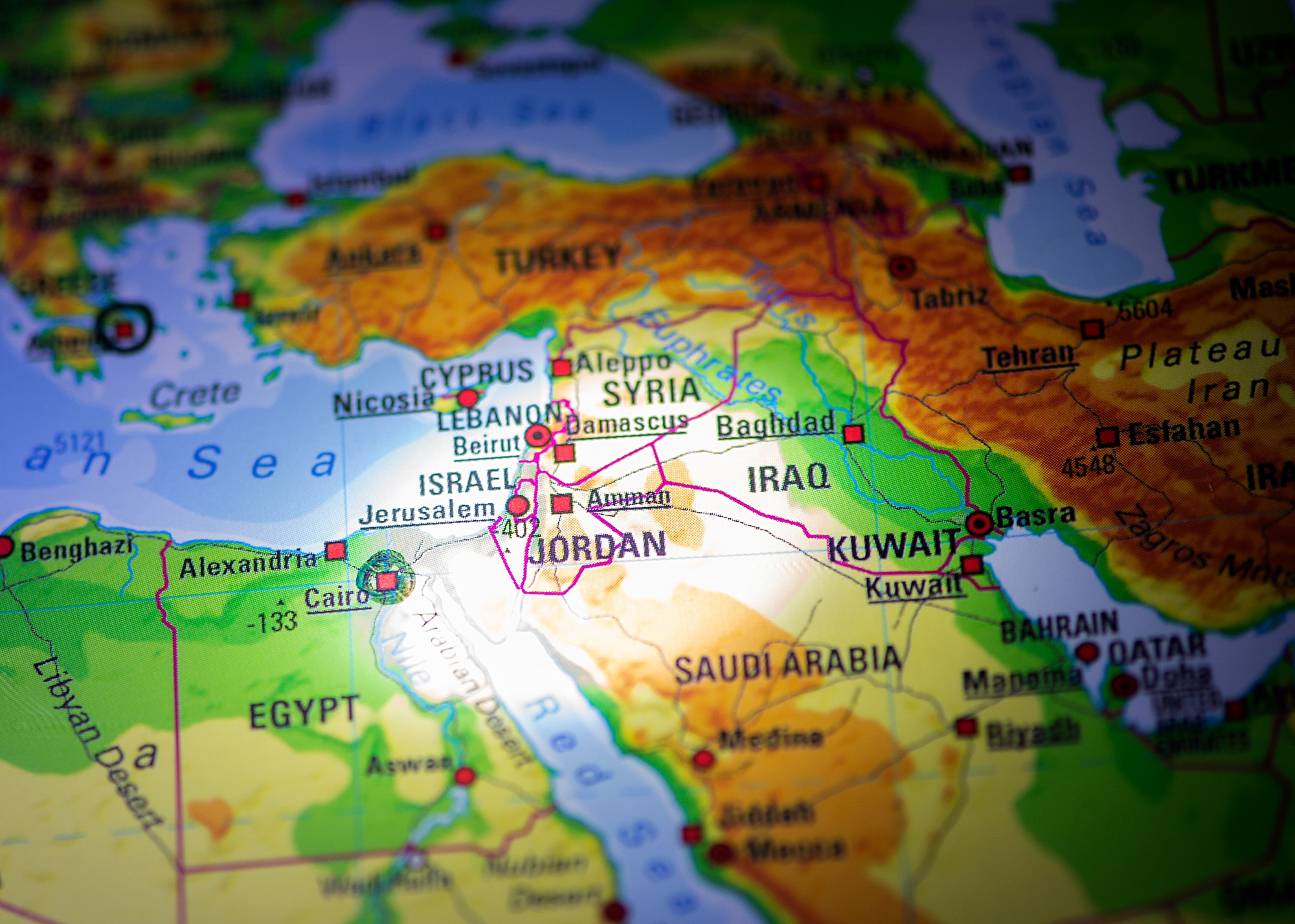 Close-up fragment of a world map with selective focus on Jordan,Jerusalem,Israel,Iarq,Kuwait